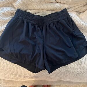 Lululemon size 14 lined track that mid rise shorts black